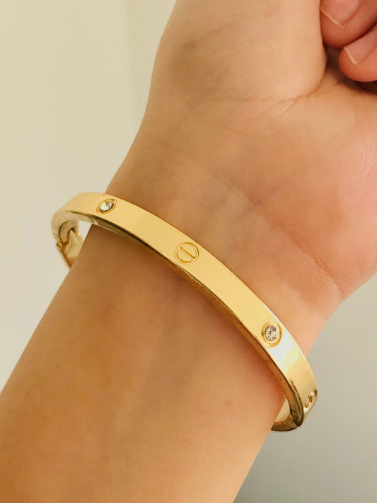 Cartier Gold Stone Bangle – Luxurious and Timeless Bracelet for Women